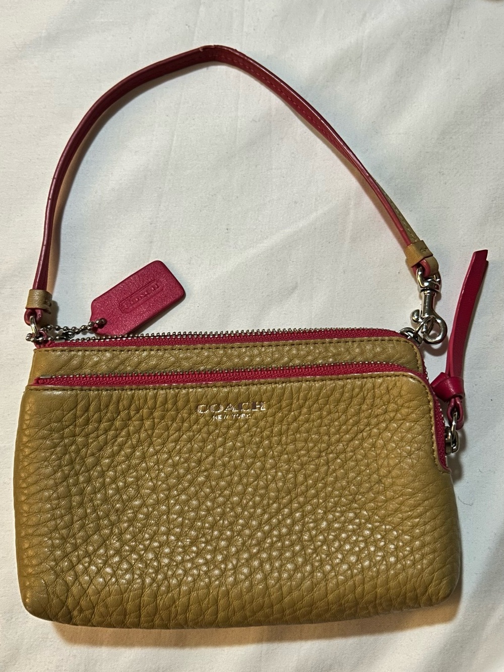 Coach Two-Tone Pebbled Leather Wristlet in Mustard and Pink